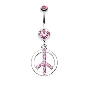 Pink peace sign belly ring